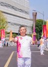 薪火接力·荣耀时刻！千年舟集团董事长陆铜华担任亚运会火炬手